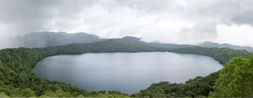 Lake Oku in Cameroon surrounded by cloud forest