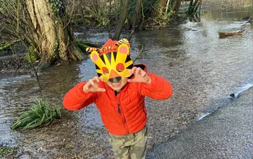 child with tiger outfit