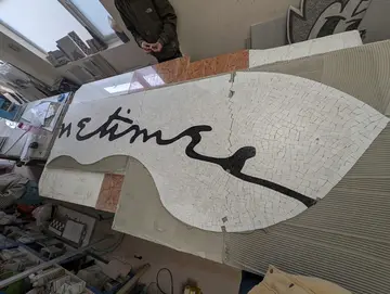 Mosaic by Linder being created in sections in a studio