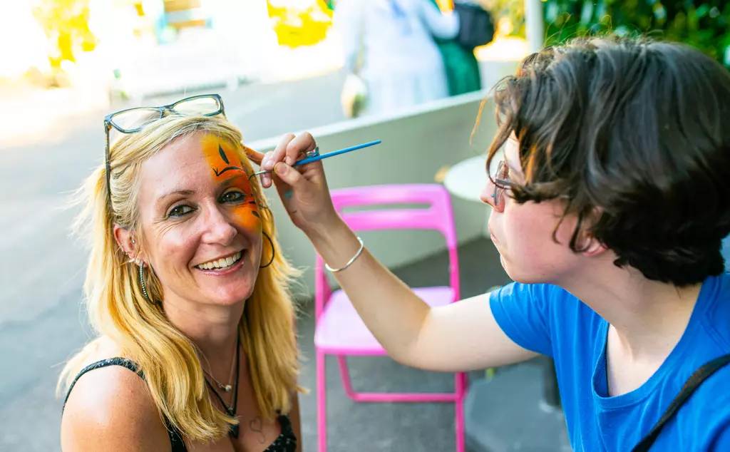 Woman getting her face painted at Zoo Nights, best things to do in London