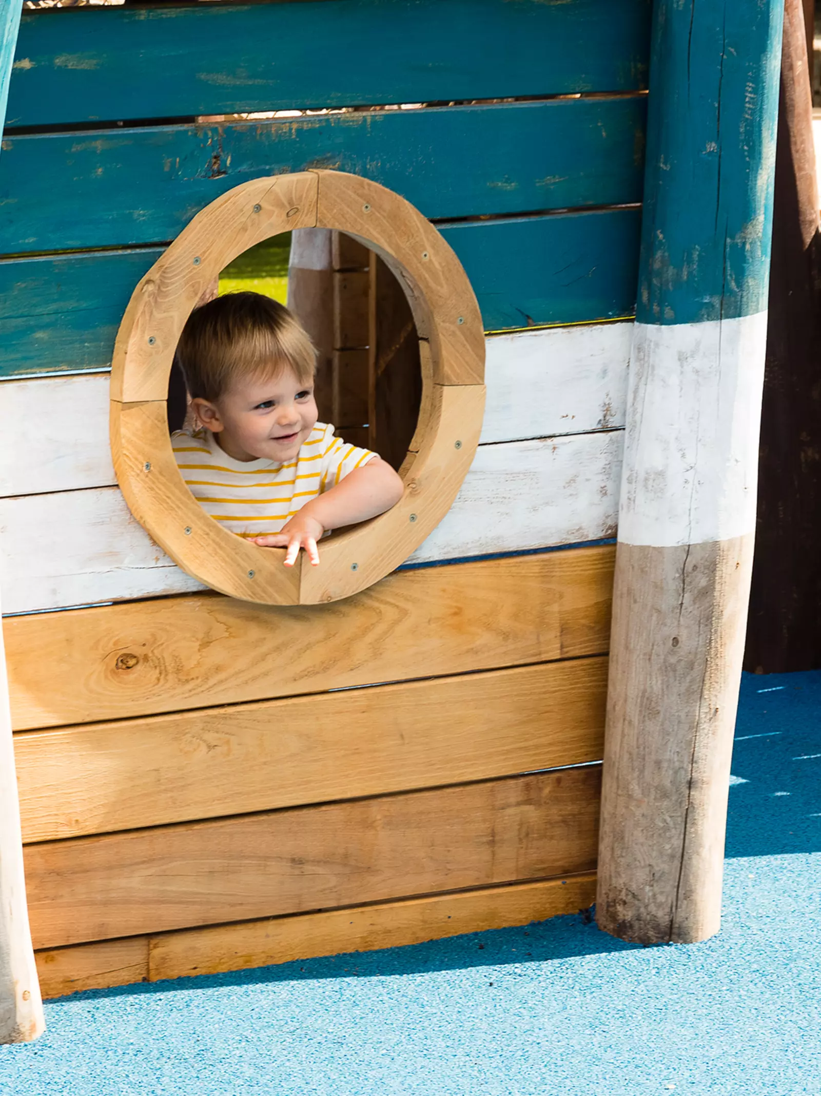 A child peers out of HMS Beagle in London Zoo's Animal Adventure
