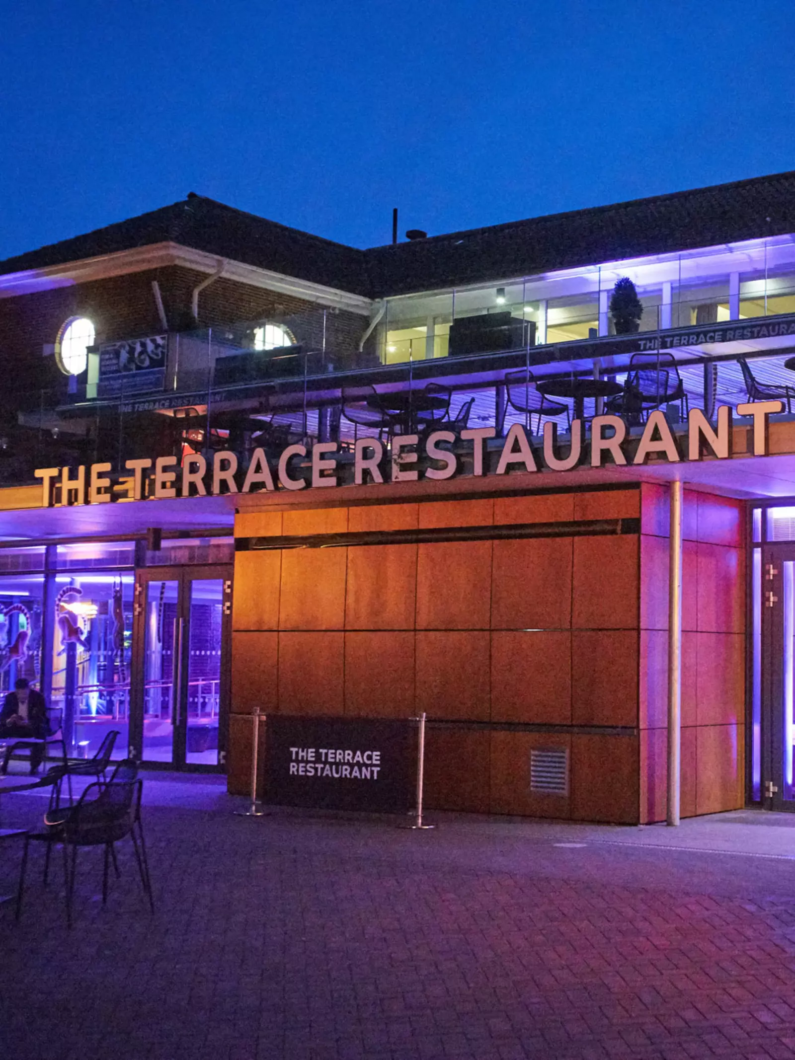 The Terrace Restaurant exterior lit up at night for an event