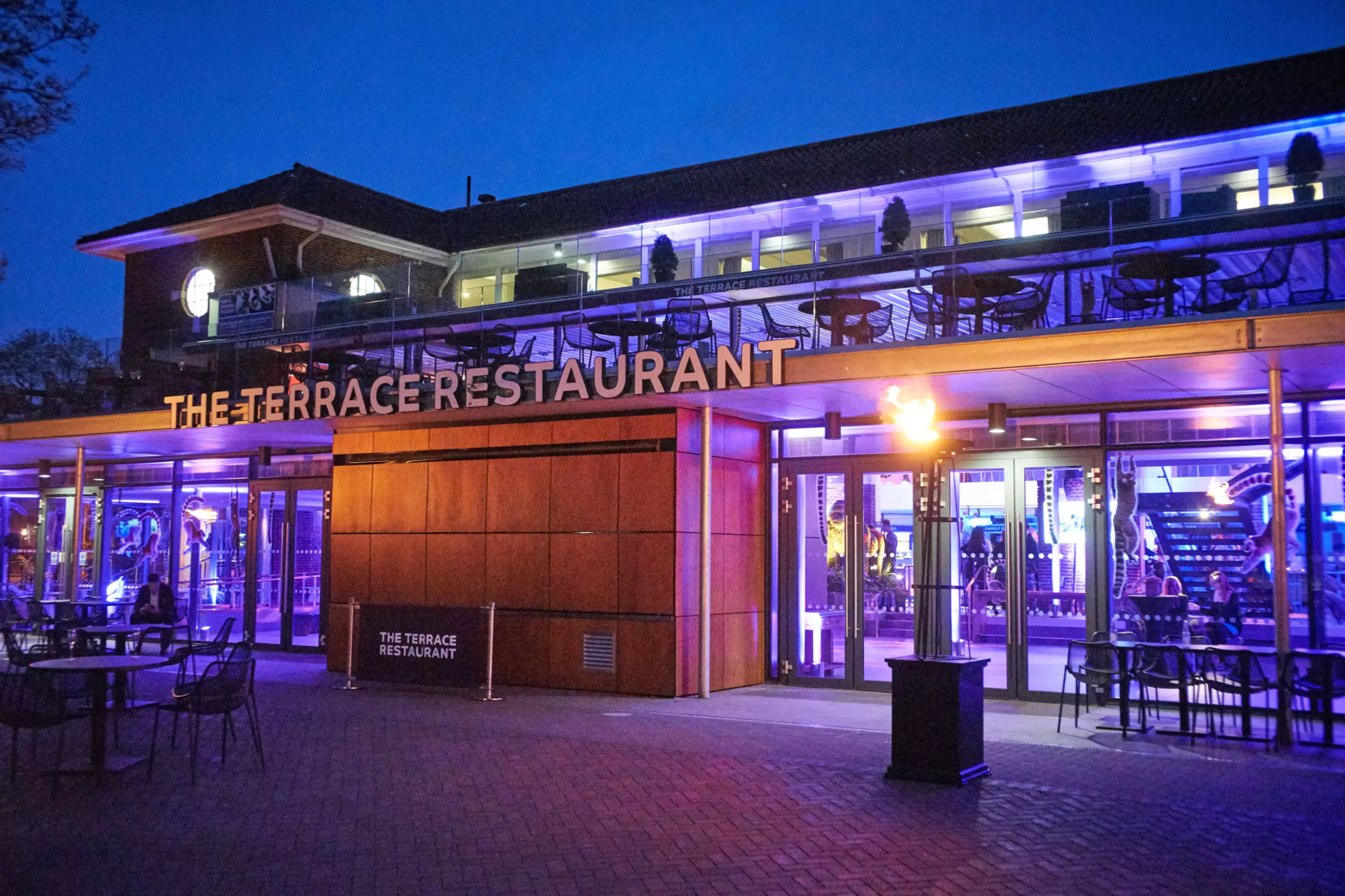 The Terrace Restaurant exterior lit up at night for an event