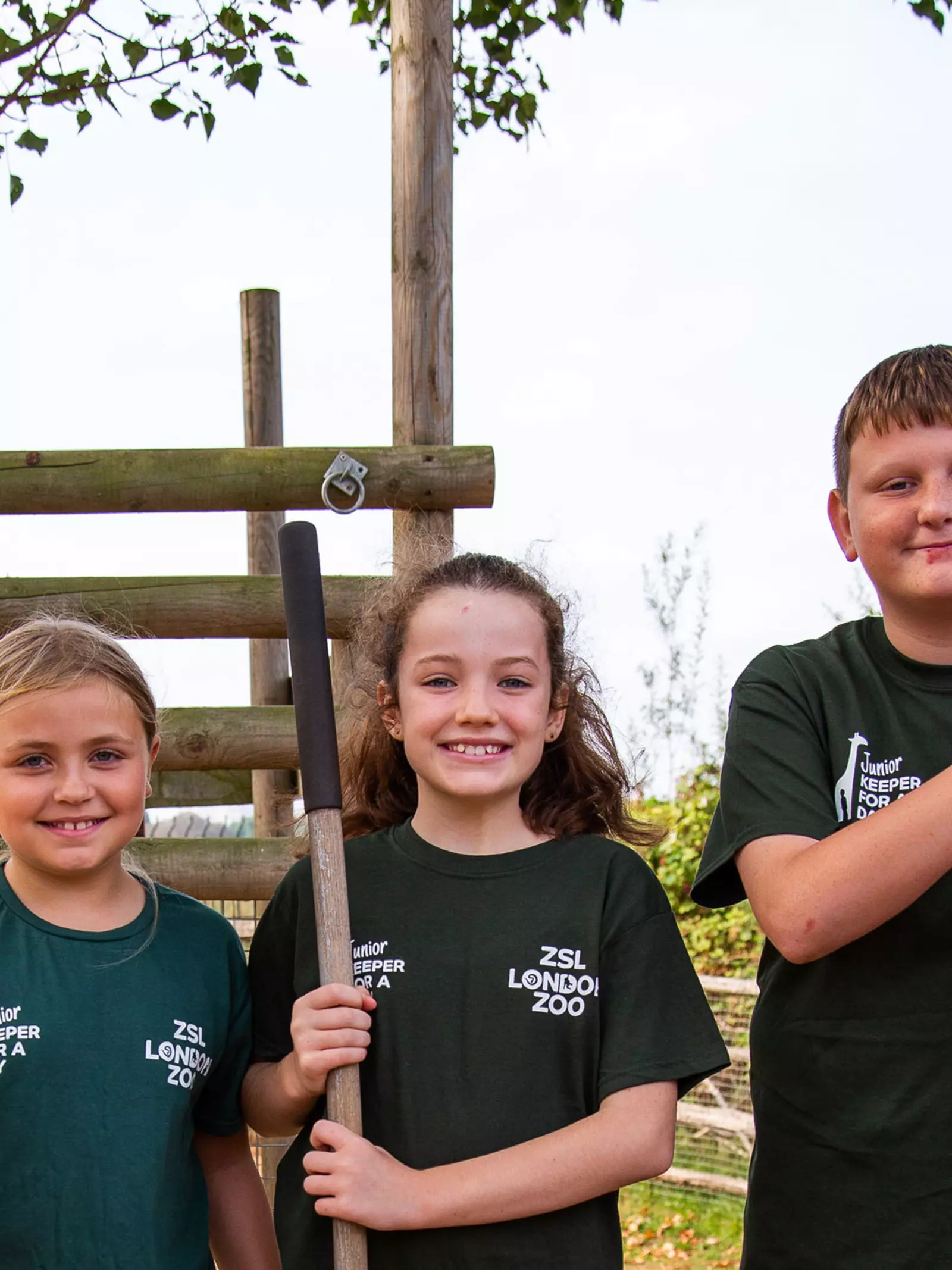 Three participants in the Junior Keeper for a Day experience at London Zoo