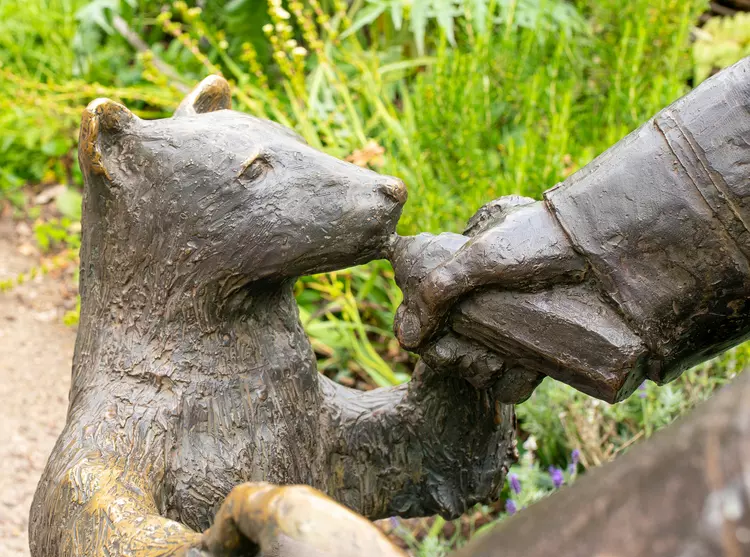 Winnie the bear statue close up