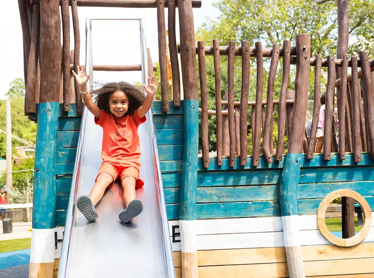 A child going down the slide in London Zoo's Animal Adventure