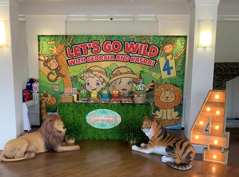 A London Zoo venue is decorated with a wildlife theme for a children's birthday party 