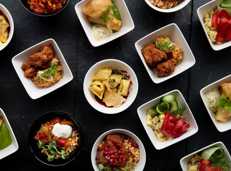 Bowl food viewed from above laid out on a table